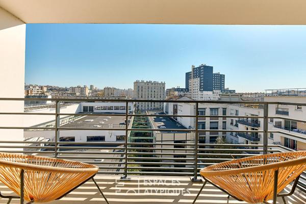 Duplex en dernier étage avec terrasses sur le Canal