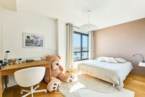 Duplex en dernier étage avec terrasses sur le Canal