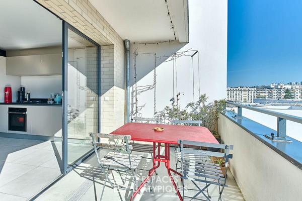 Duplex en dernier étage avec terrasses sur le Canal