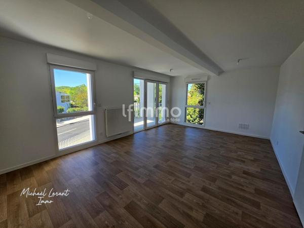 T3 avec 2 places de parking- balcon