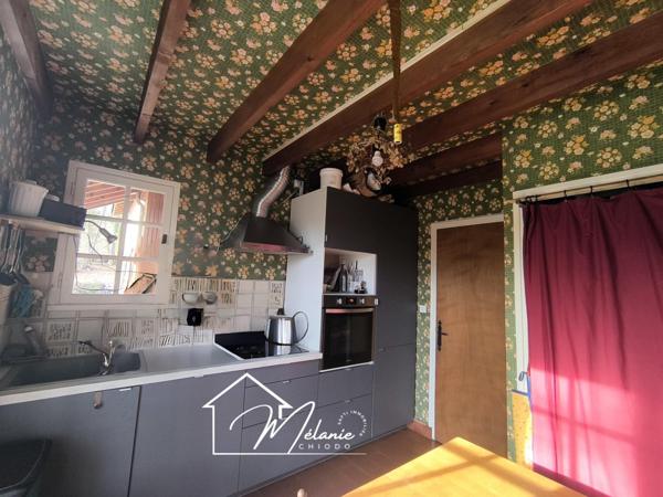 Plain-pied grand terrain, garage et pièce de vie,4 chambres