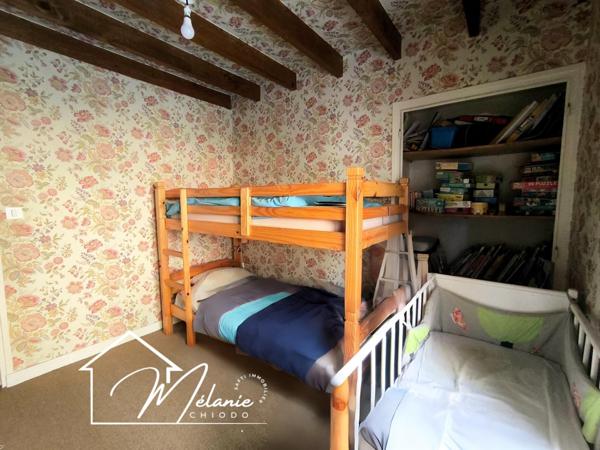 Plain-pied grand terrain, garage et pièce de vie,4 chambres