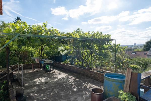 Maison dans un écrin de verdure à 30' du centre de Paris
