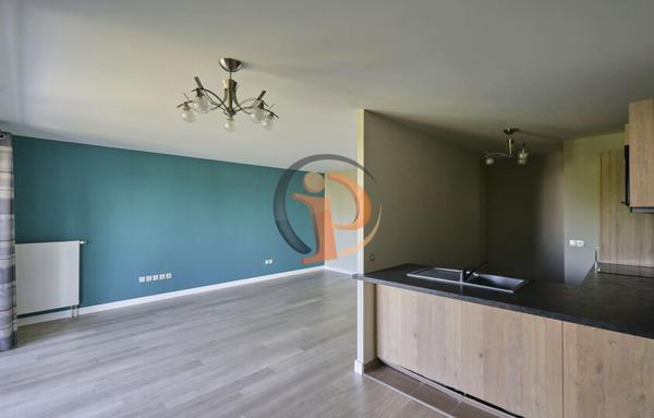 Appartement 2 chambres,  salon séjour,  balcon et garage