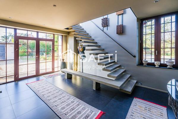 Maison d'architecte à proximité du centre-ville, des écoles et des commerces