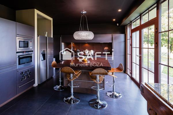 Maison d'architecte à proximité du centre-ville, des écoles et des commerces