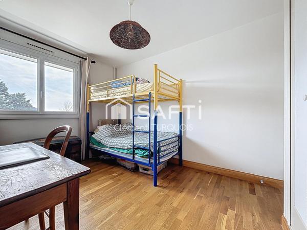TYPE 4 avec balcon, ascenseur, cave et garage