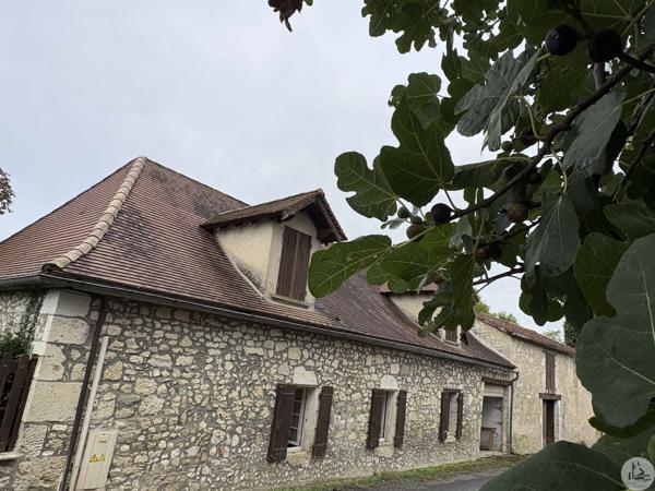 Maison de village, terrain et grange