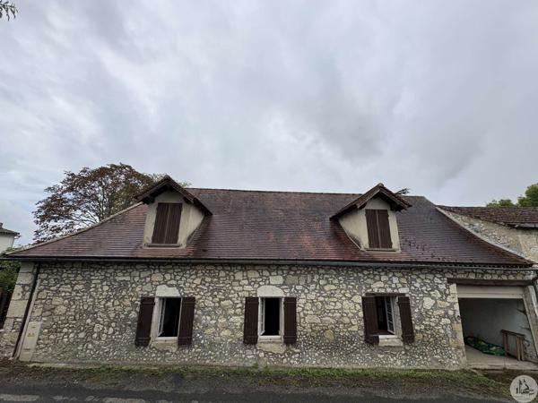 Maison de village, terrain et grange