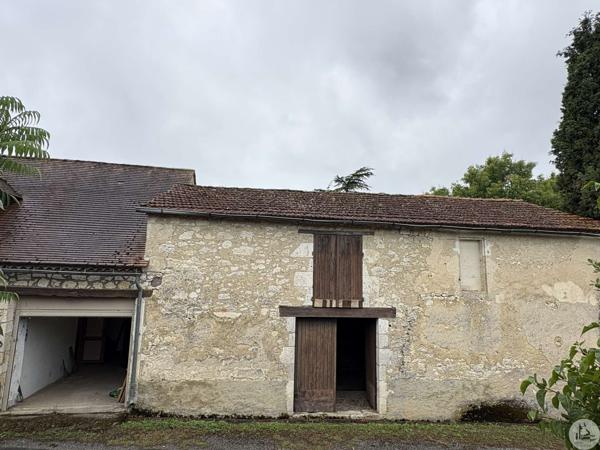 Maison de village, terrain et grange