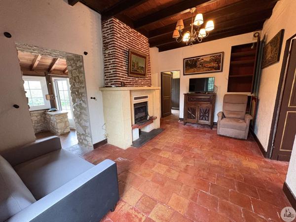 Maison de village, terrain et grange