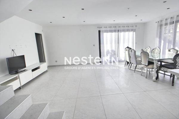 Venissieux-Limite St-Fons: Proche tramways T4 Maison recente RT2012 avec garage et jardin arboré