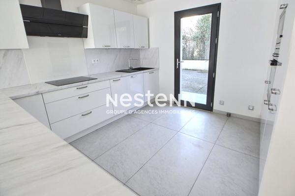 Venissieux-Limite St-Fons: Proche tramways T4 Maison recente RT2012 avec garage et jardin arboré