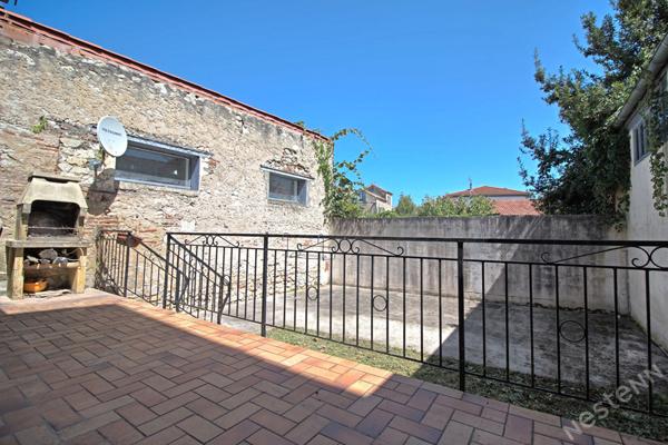 AGEN CENTRE - Maison de ville de 150 m² de type 4 avec terrasse, jardin et cave.