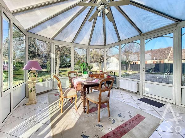 Maison familiale 4 chambres avec véranda et parc paysagé