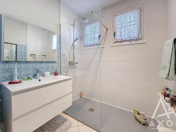 Maison familiale 4 chambres avec véranda et parc paysagé