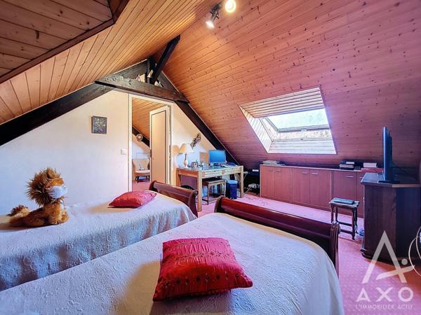 Maison familiale 4 chambres avec véranda et parc paysagé