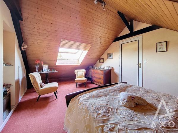 Maison familiale 4 chambres avec véranda et parc paysagé