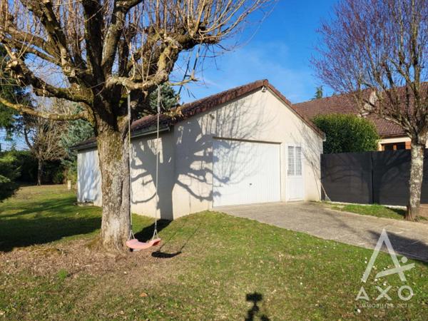 Maison familiale 4 chambres avec véranda et parc paysagé