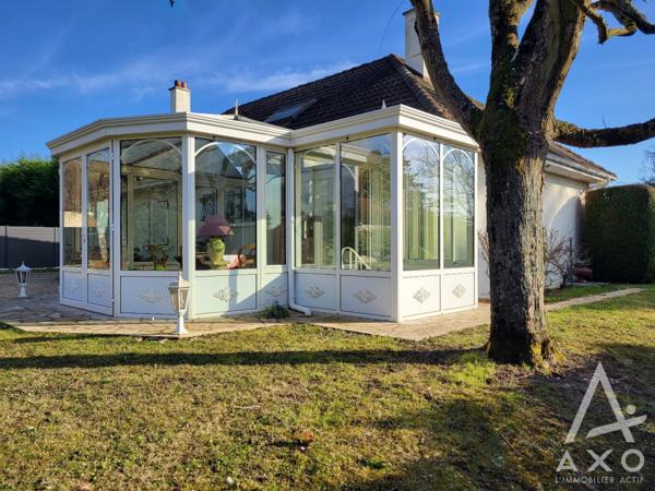 Maison familiale 4 chambres avec véranda et parc paysagé