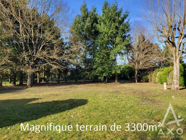 Maison familiale 4 chambres avec véranda et parc paysagé