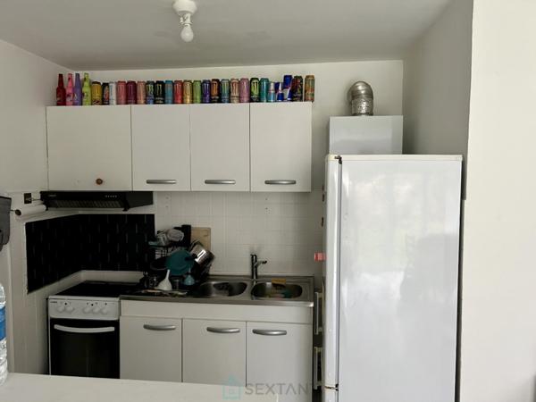 Appartement en rdc avec grand jardin privatif et garage.