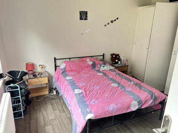 Appartement en rdc avec grand jardin privatif et garage.