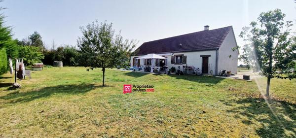 Maison de plain-pied - 101 m² - 5 pièces - 4 chambres - terrain de 1900 m2 avec puits