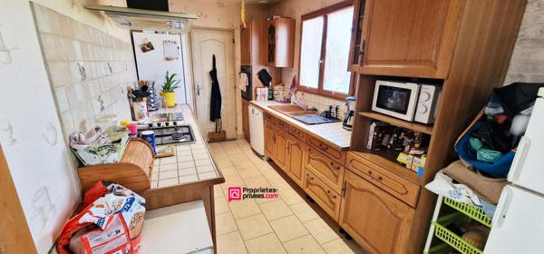 Maison de plain-pied - 101 m² - 5 pièces - 4 chambres - terrain de 1900 m2 avec puits