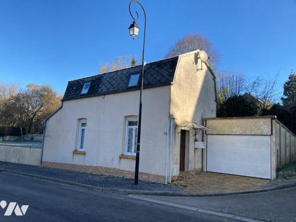 petite maison de village à rénover avec jardin et garage