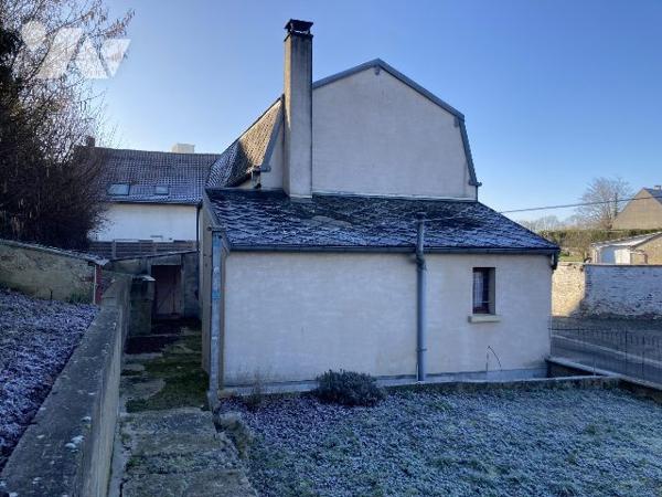 petite maison de village à rénover avec jardin et garage