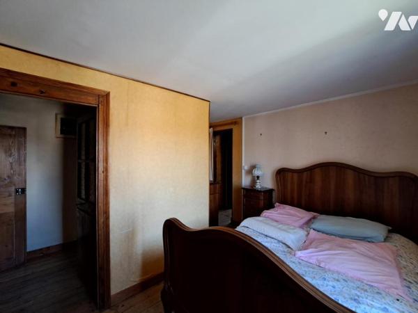 Maison de caractère avec grand garage et jardinet