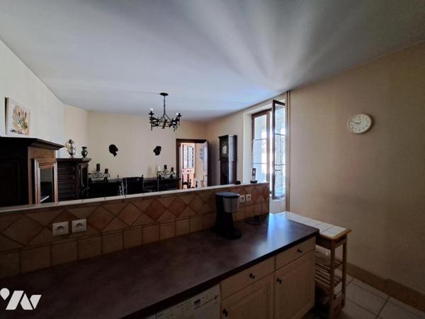 Maison de caractère avec grand garage et jardinet