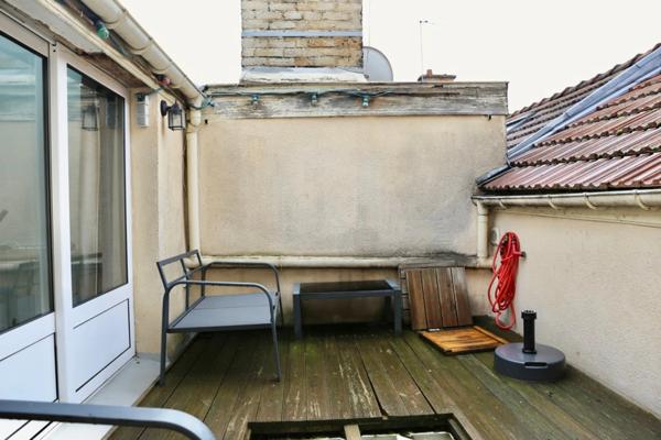 A vendre à REIMS (51) centre ville, une maison +garage+terrasse+cave voutée