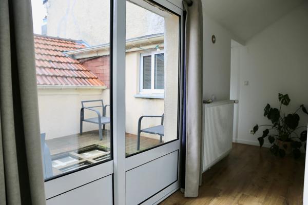 A vendre à REIMS (51) centre ville, une maison +garage+terrasse+cave voutée