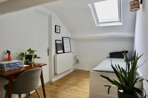 A vendre à REIMS (51) centre ville, une maison +garage+terrasse+cave voutée