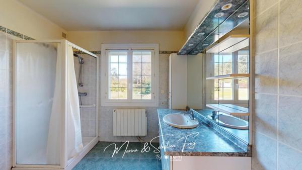 Élégante Propriété au Cœur d’un Domaine Arboré