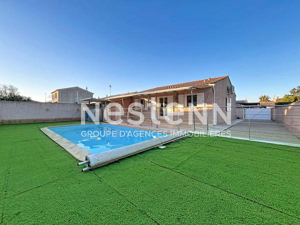 MAISON DE PLAIN-PIED AVEC GARAGE ET PISCINE
