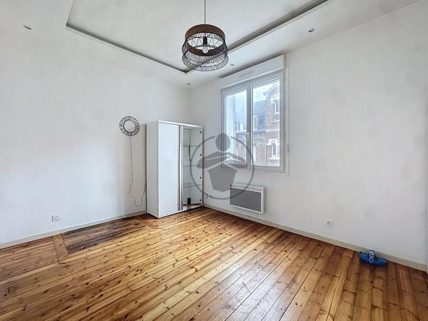 Vente                                                      Immeuble
                        
                                         76 m2                     à Saint-Quentin