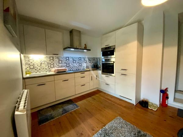 Maison de ville, activité commerciale en RDC