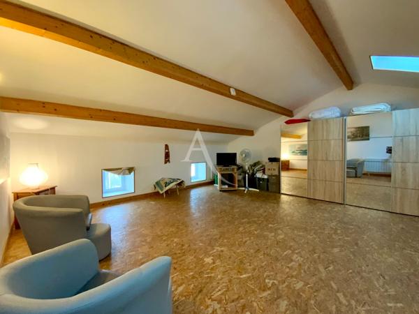 Maison de ville, activité commerciale en RDC