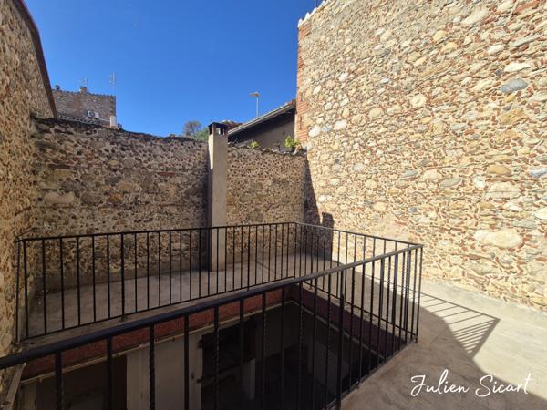 Maison de village avec extérieur et garage