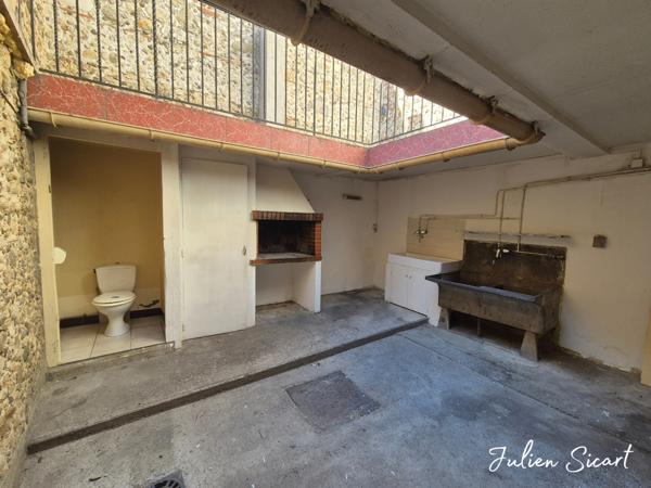 Maison de village avec extérieur et garage