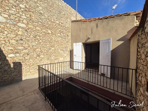 Maison de village avec extérieur et garage