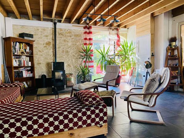 Grande maison en pierre de 386 m² avec espace modulable – 10 min de Langon