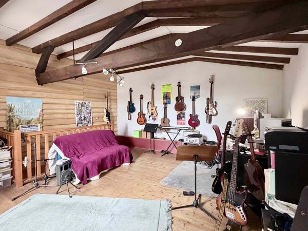 Grande maison en pierre de 386 m² avec espace modulable – 10 min de Langon