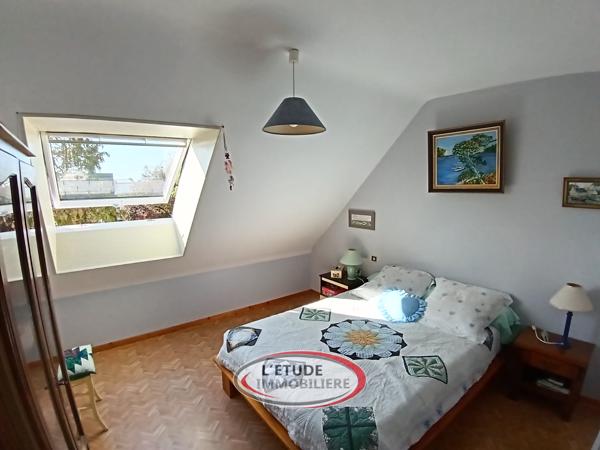 Maison familiale bien entretenue avec vie de plain-pied et 4 chambres au total