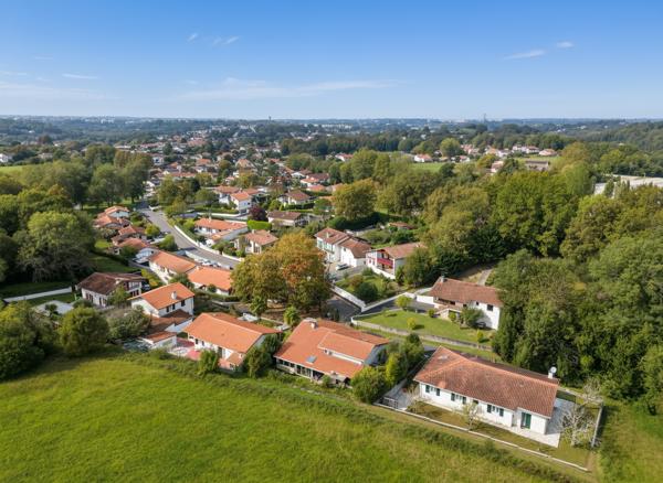 Maison individuelle T5 d'environ 110 m² habitables (153 m² au sol) avec véranda