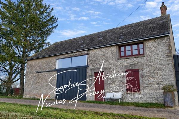 Maison à rénover avec grange attenante et grand terrain