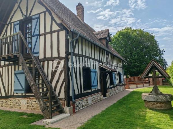 🏡 EXCLUSIVITÉ – Charmante maison néo-normande avec sous-sol complet, patio et jardin paysagé au cœur de Bourneville

Idéalement située au centre de Bourneville-Sainte-Croix, à proximité immédiate des commerces, des écoles et de toutes les commodités accessibles à pied, cette élégante maison individuelle de style néo-normand construite en 1990 saura vous séduire par son authenticité, son confort et la qualité de son environnement.

Proposée en exclusivité par Claudine LEBELLOIS – BSK Immobilier, cette propriété bénéficie d'un emplacement privilégié, à seulement quelques minutes des accès A13 et A131, permettant de rejoindre facilement Rouen, Le Havre, Caen ou Paris.

Un véritable esprit normand
Derrière sa façade au charme typiquement régional se dévoile une maison chaleureuse, implantée sur un terrain clos, arboré et soigneusement paysagé de 599 m². Son agréable patio en ossature bois constitue un espace privilégié pour profiter des beaux jours, partager des repas en extérieur ou simplement se détendre dans un environnement calme et verdoyant.

Une pièce de vie chaleureuse et conviviale
Dès l'entrée, vous découvrirez une atmosphère accueillante où le charme de la Normandie s'exprime pleinement. L'espace repas, agrémenté d'une cheminée avec insert bois, invite aux moments de convivialité en famille ou entre amis. Dans son prolongement, la cuisine aménagée et équipée d'environ 18 m² séduit par ses meubles en chêne massif et ses authentiques tomettes au sol, qui lui confèrent tout le cachet des maisons normandes traditionnelles.
Le salon indépendant offre quant à lui un véritable cocon de détente. Sa cheminée à foyer ouvert apportera chaleur et authenticité aux longues soirées d'hiver, tout en faisant le bonheur des amateurs de feu de bois.
Un WC avec lave-mains complète le rez-de-chaussée.

Un espace nuit confortable
À l'étage, un palier dessert trois chambres lumineuses offrant chacune un cadre de vie agréable. L'une d'elles dispose d'un dressing ainsi que d'un charmant balcon sous queue de geai, élément architectural emblématique des demeures normandes, avec une vue dégagée sur le jardin. Une salle de bains familiale équipée d'une baignoire, d'un meuble double vasque et d'un WC complète cet étage.

Un sous-sol complet : un véritable atout
Particulièrement rare et recherché, le sous-sol intégral offre de nombreuses possibilités d'aménagement et de stockage. Vous y trouverez :
• Une réserve carrelée
• Un cellier
• Une cave pouvant également servir d'atelier
• Un garage spacieux permettant de stationner un véhicule et de stocker matériel et équipements

Des équipements de qualité
La maison dispose de nombreux équipements apportant confort et praticité au quotidien :
✔ Chauffage principal par insert bois performant
✔ Cheminée à foyer ouvert dans le salon
✔ Cuve enterrée de récupération des eaux pluviales de 32 m³ équipée d'un surpresseur et d'un système de filtration pouvant alimenter les WC et la machine à laver
✔ Portail aluminium motorisé
✔ Porte de garage motorisée avec ouverture par digicode
✔ Descente de garage aménagée
✔ Stationnement extérieur pour trois véhicules
✔ Huisseries bois double vitrage
✔ Volets bois traditionnels

Un cadre de vie privilégié
Bourneville-Sainte-Croix est une commune particulièrement appréciée pour sa qualité de vie. Vous profiterez d'un environnement familial avec écoles maternelle et primaire, collège, commerces de proximité, infrastructures sportives et vie associative dynamique.
Son emplacement stratégique permet de bénéficier du calme de la campagne tout en restant parfaitement connecté aux grands pôles économiques de la région.
✨ Cette propriété pleine de charme représente une opportunité rare pour une famille en quête d'un cadre de vie paisible, confortable et authentique, à proximité immédiate des commodités.
Une visite vous permettra d'en apprécier tout le potentiel et le caractère unique.
📞 Pour plus d'informations ou organiser une visite, contactez :
Claudine LEBELLOIS – BSK Immobilier
06 46 67 24 09